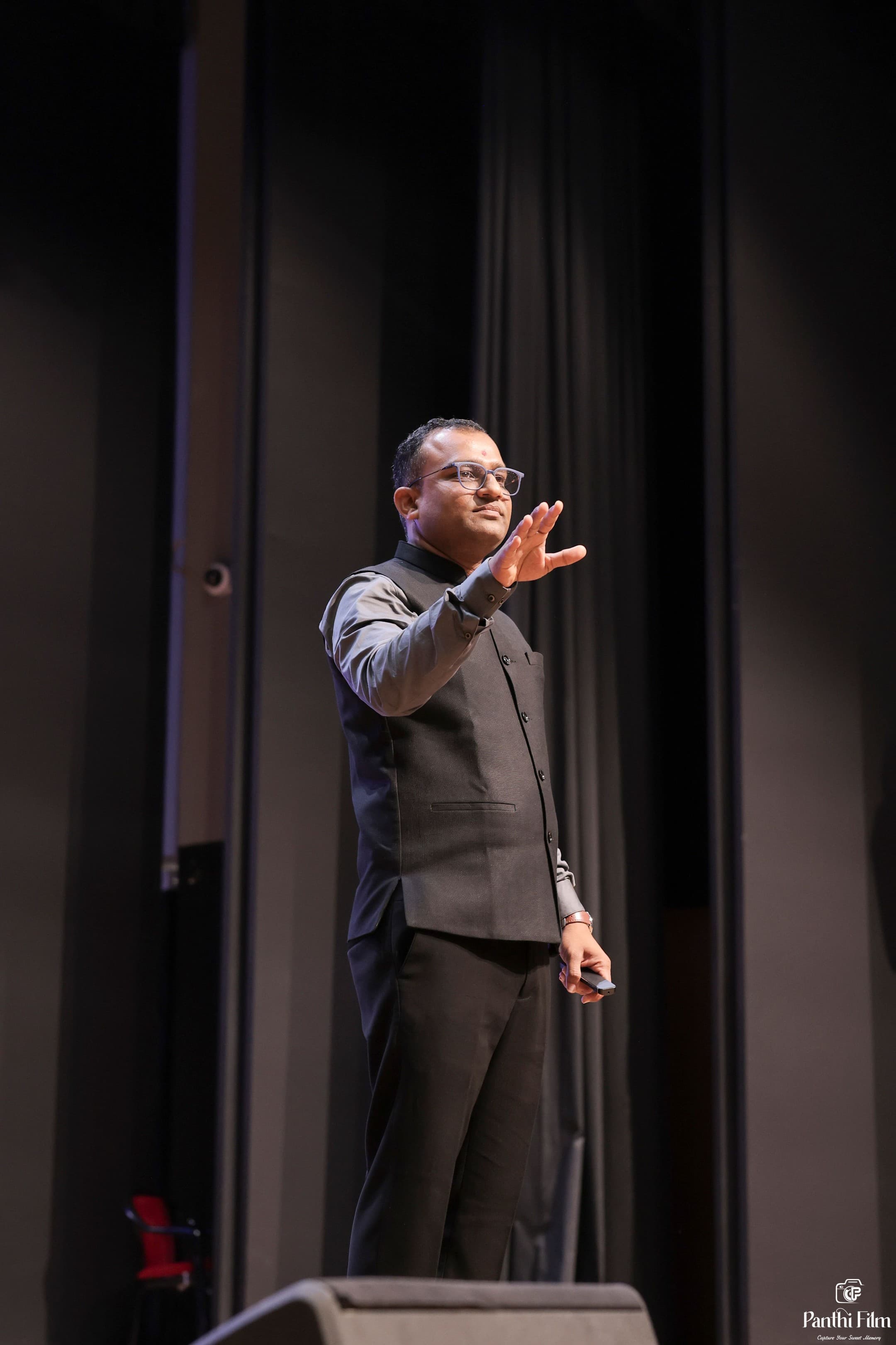 Bhautik Kumar Vaghasiya speaking at a conference